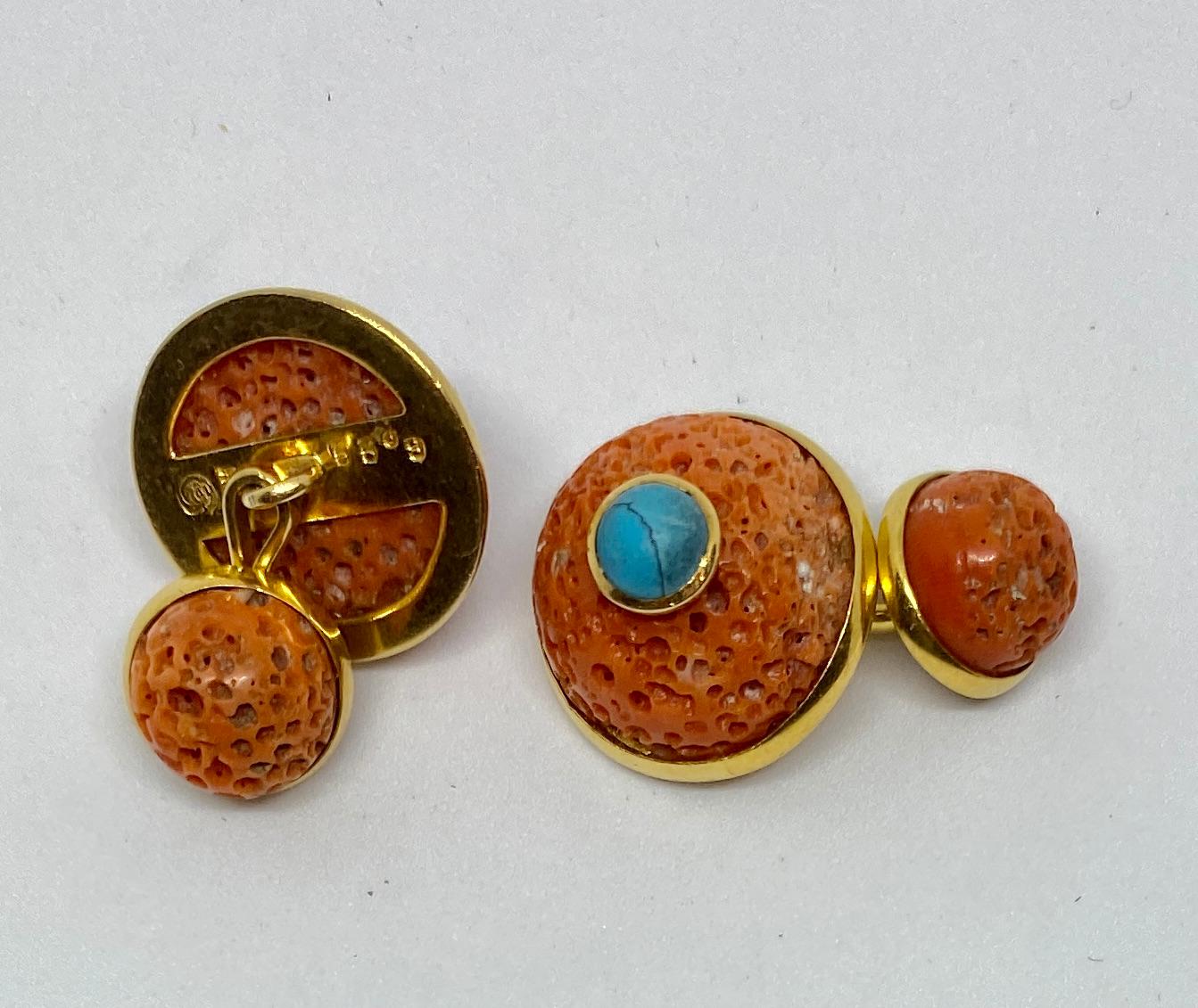 A spectacular pair of handmade double-sided cufflinks featuring orange-red coral 