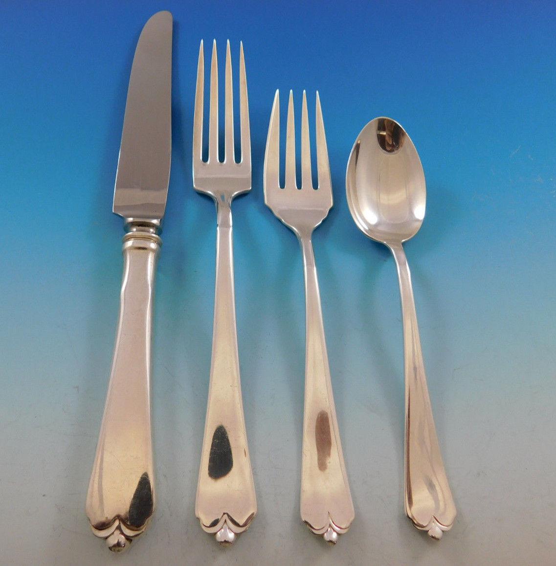 Lotus by Watson-Wallace sterling silver Flatware set, 32 pieces. This set includes:

Eight Knives, 9