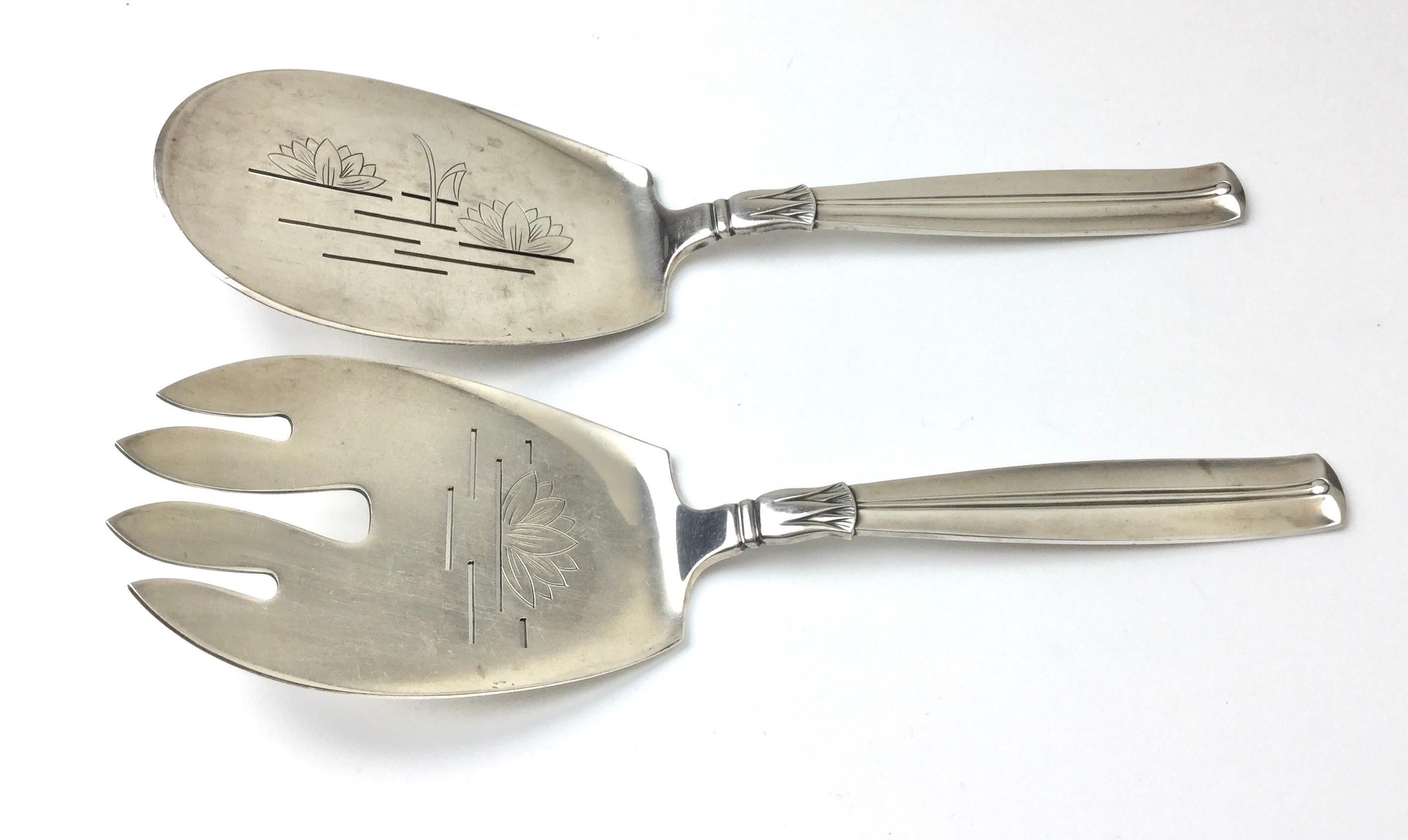 Lotus by W&S Soerensen Denmark sterling silver fish serving set lotus pattern. Measure: 9” long. Great age appropriate condition. Could use a better polishing no digs or dents.