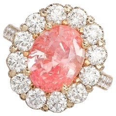 Certificado Lotus 10 ct. Anillo de oro rosa con zafiro y diamantes sin tratar Padparadscha