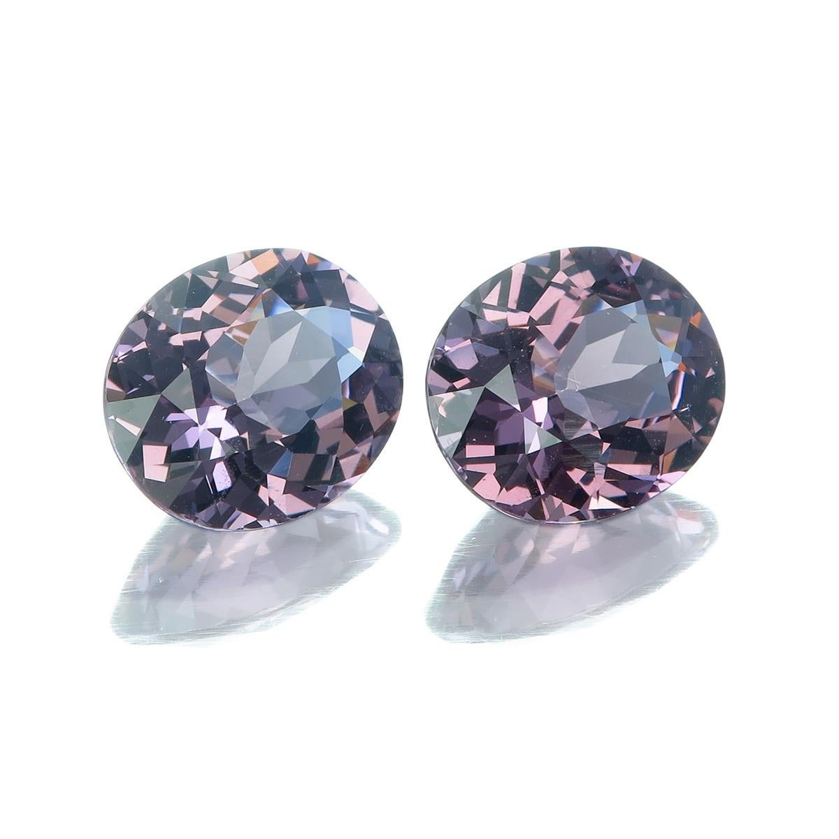Pair of lovely sparkling Purple Spinels at 2.57 & 2.52 carat; total of 5.09 carat.
We can make a pair of beautiful unique earrings for you, let us know your design and we will create a pair of one-of-a-kinds. 
Dimension: 9.44 x 7.95 x 4.73 mm
      