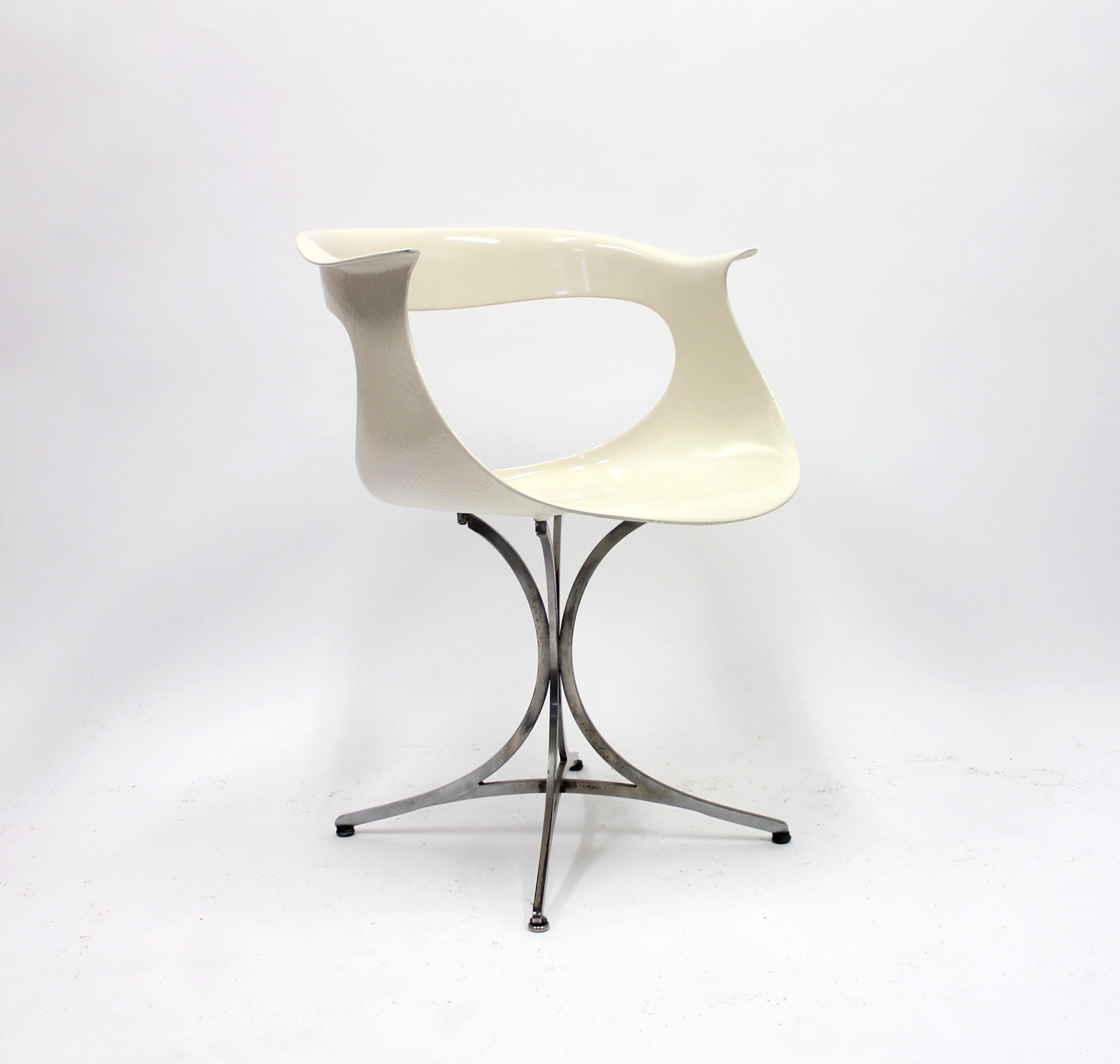 Lotus chair by husband and wife team Erwine & Estelle Laverne for their own company Laverne International. This piece was designed in the 1960s and has a really sense of space age design about it. A few very small crack occurs on the top of the