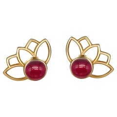 Lotus earrings studs with rubies in 14k gold. 