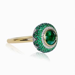 Lotus East West Ring with 2ct Emerald Oval Solitaire, Emerald Petals & Diamonds
