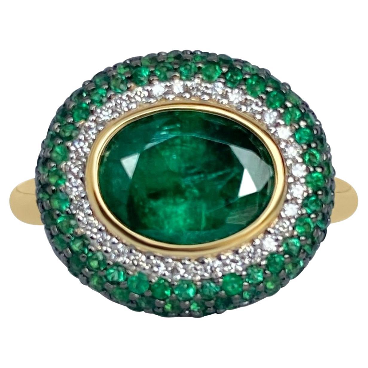 Lotus East West Ring with 2ct Emerald Oval Solitaire, Emerald Petals & Diamonds For Sale