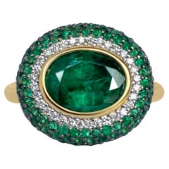 Lotus East West Ring with 2ct Emerald Oval Solitaire, Emerald Petals & Diamonds