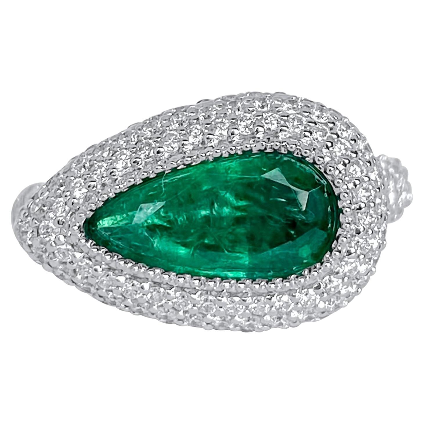 Lotus East West Ring with 2ct Emerald Solitaire, Blue Sapphire and Diamonds For Sale