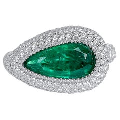 Lotus East West Ring with 2ct Emerald Solitaire, Blue Sapphire and Diamonds