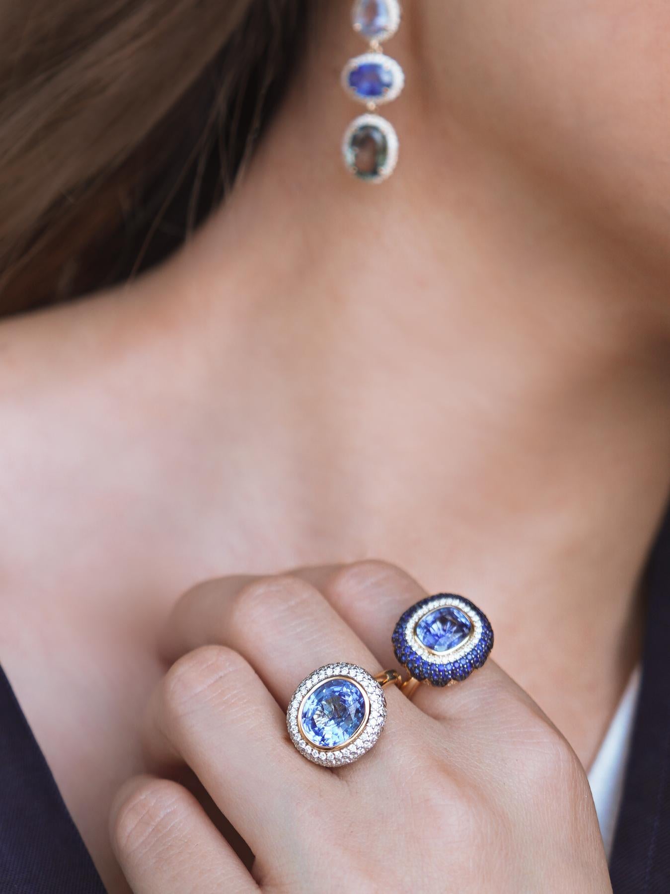 14k Yellow Gold. These any-finger rings include a dazzling OVAL-shaped Ceylon Blue Sapphire solitaire of approximately 4ct, pave set emerald petals in a lotus motif, and pave set brilliant cut white diamonds. Rinoor's re-imagined rings, are