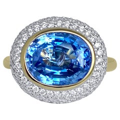Lotus East West Ring with 4ct Ceylon Blue Sapphire, Emerald and Diamonds