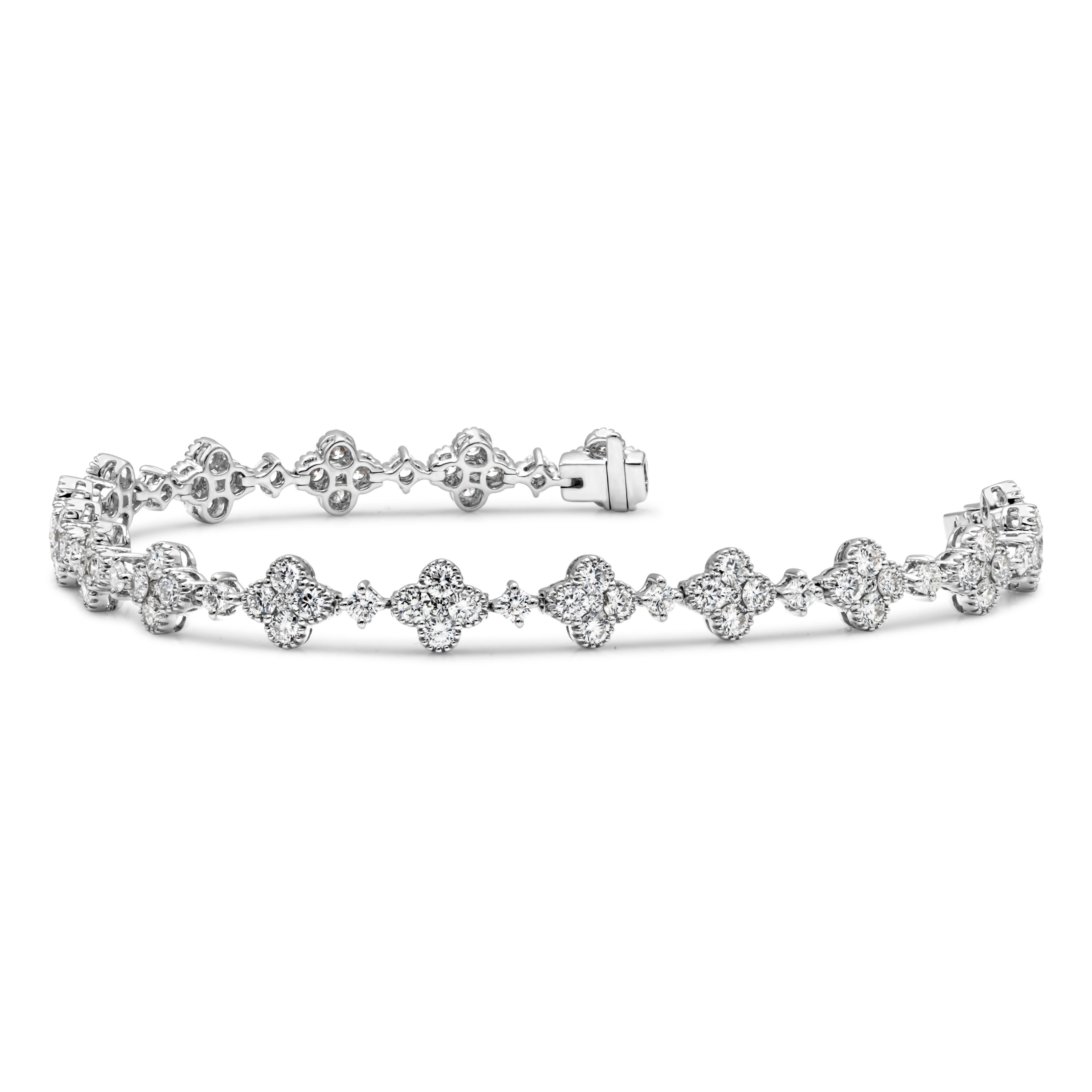 A simple yet lovely tennis bracelet showcasing a 102 brilliant round cut diamond set in a beautiful lotus floral-motif design weighing 4.63 carats total, G color, VS-SI1 in clarity. Separated by round shape diamond, set in a four prong basket