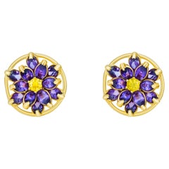 Lotus flower earrings studs in 14k gold. 