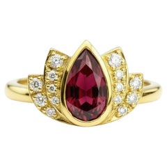 Lotus gold ring with garnet silver, gold