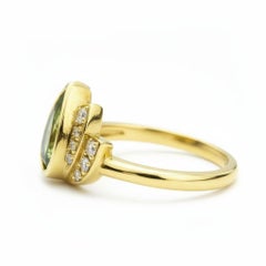 Lotus gold ring with peridot silver, gold