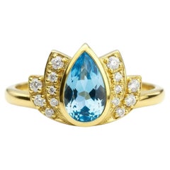 Lotus gold ring with topaz silver, gold