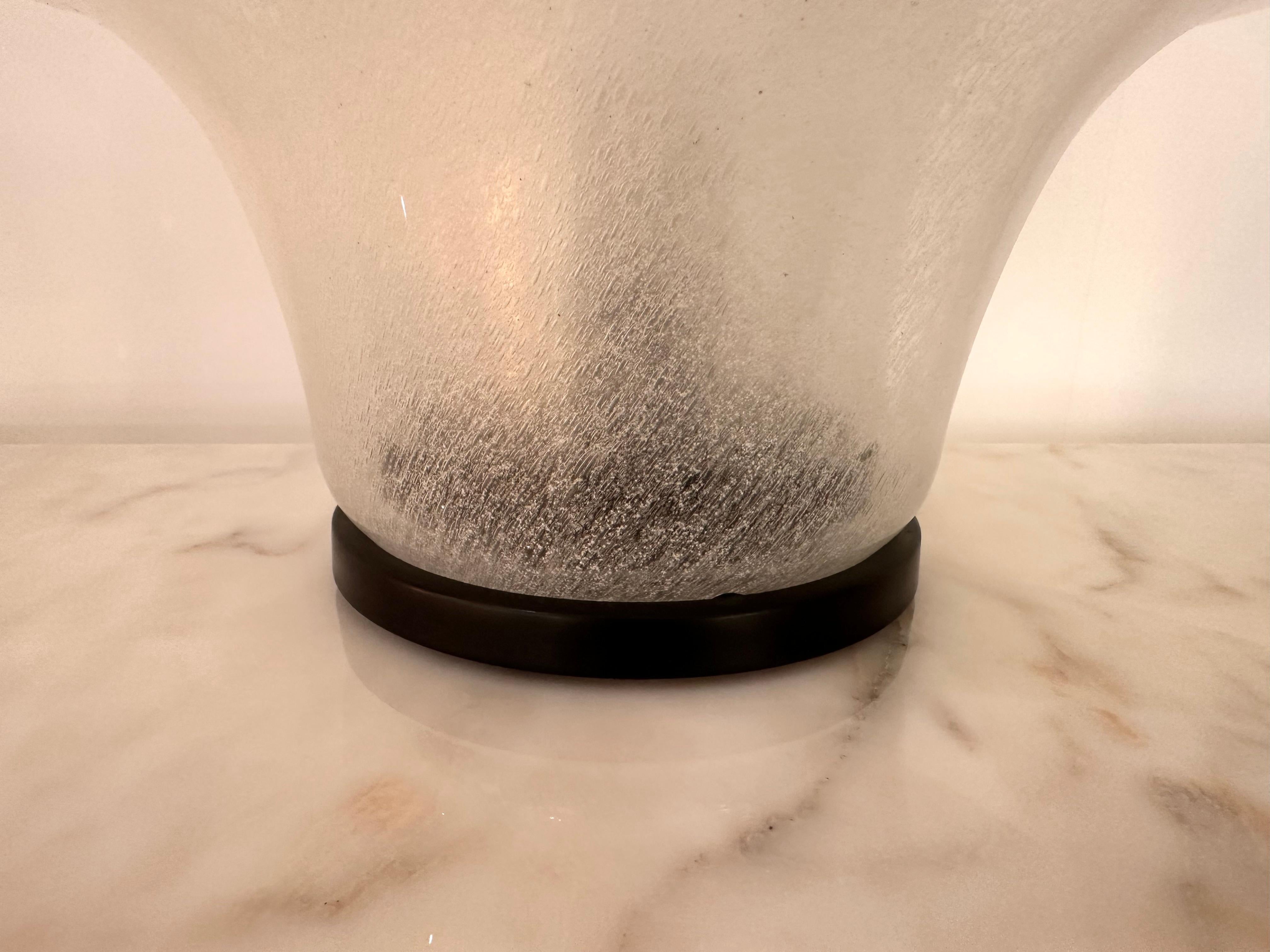 Mid-Century Modern Space Age  table lamp Lotus model LT305, pelegoso bubble Murano glass and black metal base by Carlo Nason for the manufacture Mazzega. Famous italian design like Venini, Vistosi, La Murrina, Aldo Nason, Stilnovo, Joe Colombo,