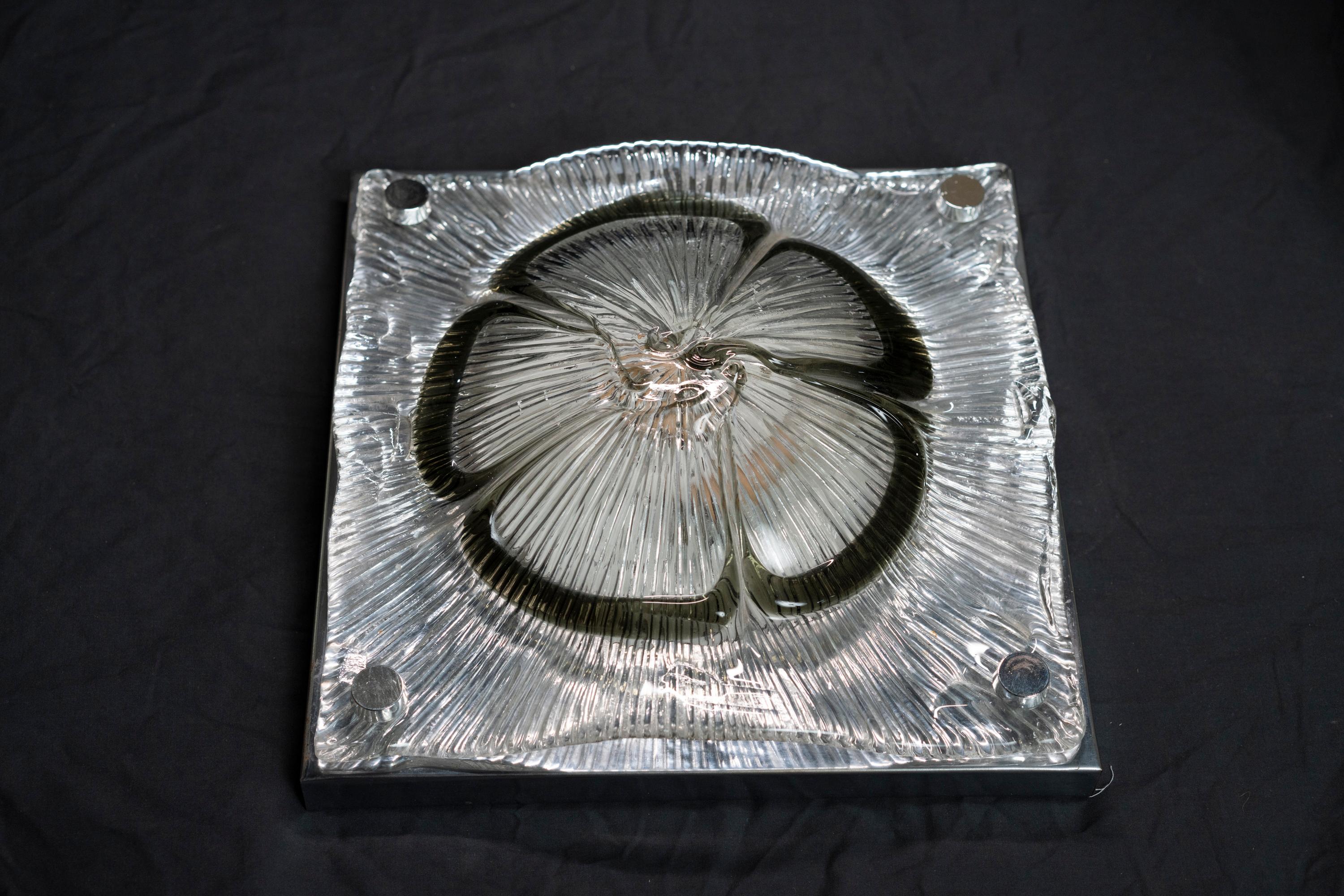 Lotus shaped form glass flush mount by Zucheri Venini inset in a chrome frame.
 