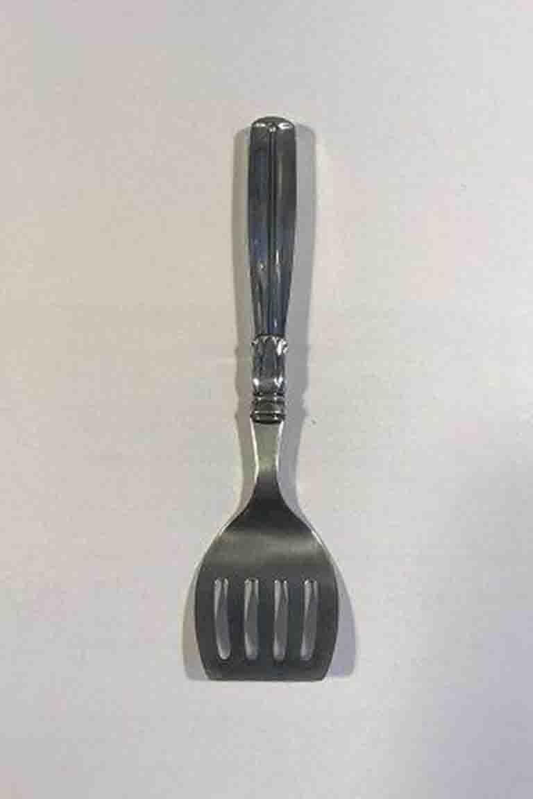 Lotus Silver and Stainless steel herring fork W. & S. Sørensen

Measures: L 17cm/6.69