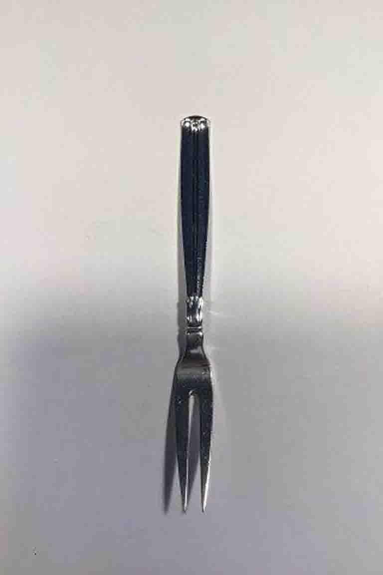Lotus silver cold cuts fork W. & S. Sørensen

L 14.5 cm /5.70