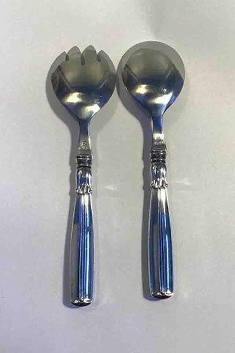 Set da insalata Lotus in argento/acciaio W. & S. Sørensen

Misura 18 cm (7 3/32