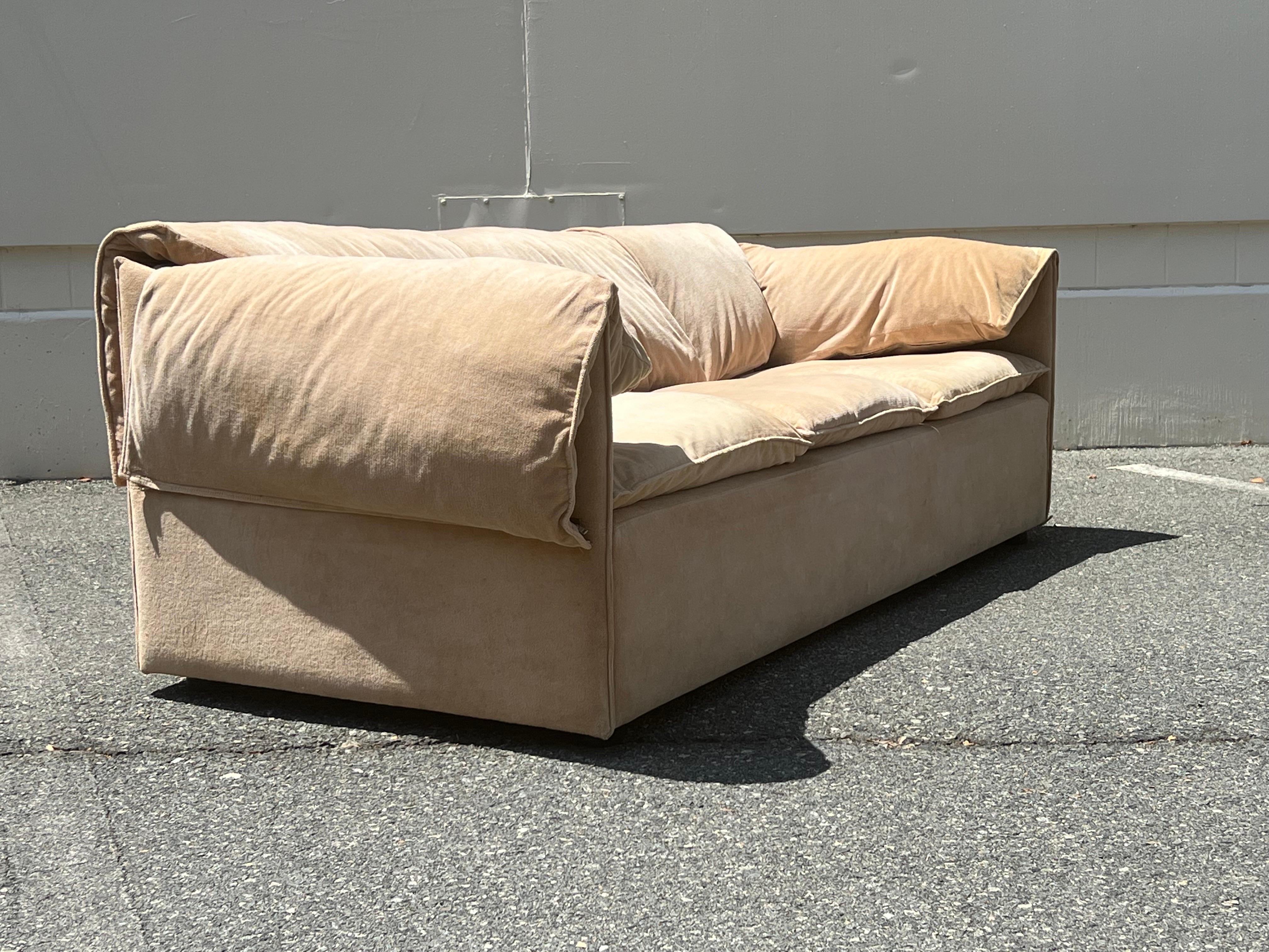 Unique “Lotus” Sofa by Niels Bendtsen for Niels Eilersen, 1974. Made in Denmark with original tan / camel upholstery. Overall wear is consistent with age, regarding the upholstery and could use new foam and fabric for an updated look. The sides and
