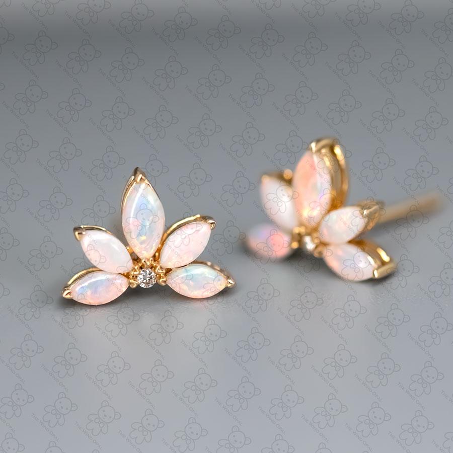 Lotus Water Lily Design Australian Solid Opal Diamond Earrings 14K Yellow Gold.


Free Domestic USPS First Class Shipping!  Free One Year Limited Warranty!  Free Gift Bag or Box with every order!



Opal—the queen of gemstones, is one of the most