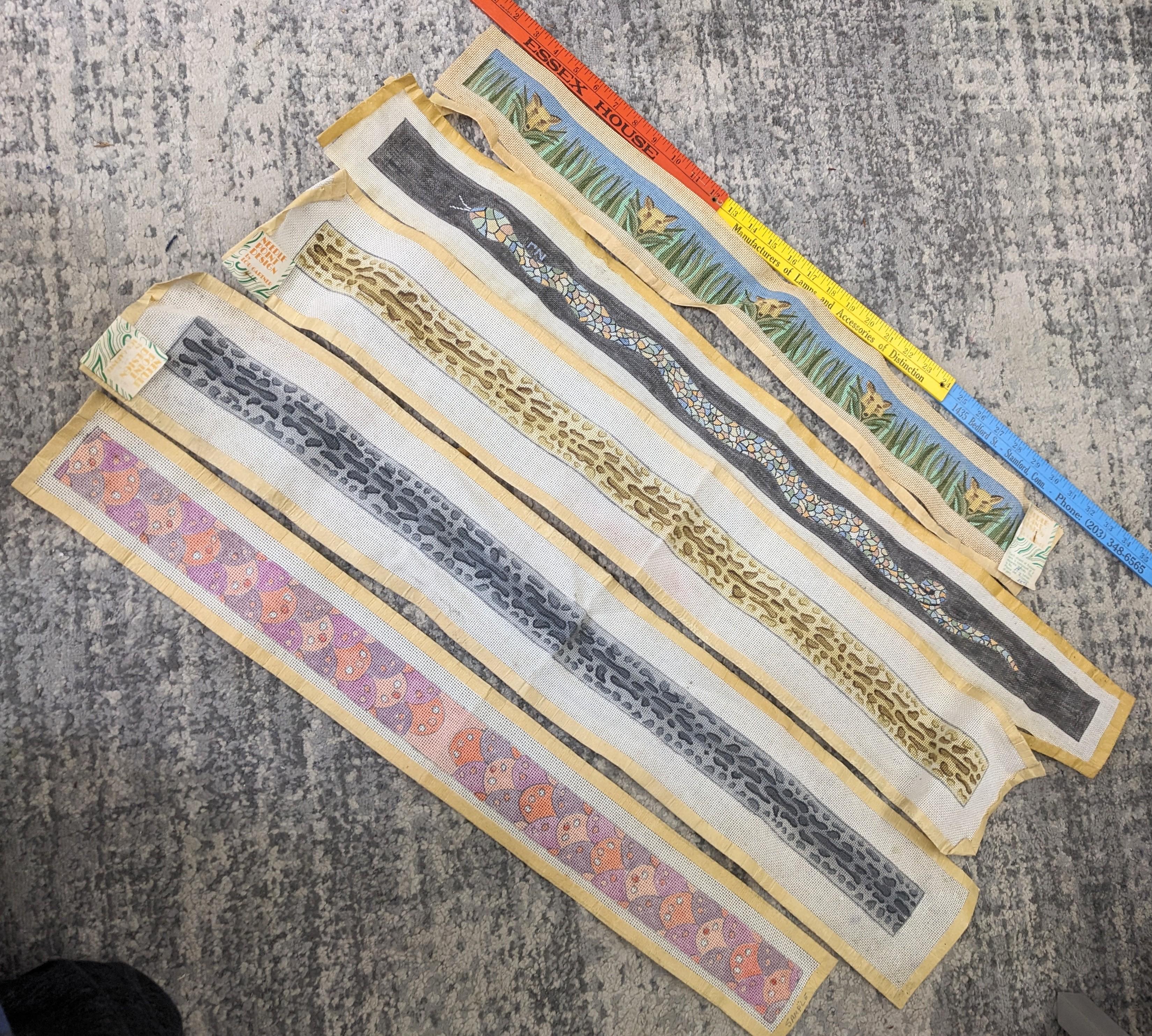 Hand painted Lou Gartner Needlepoint Blanks, Belts/Straps from the 1960s-70s from his estate. The longer ones are likely belts or pulls and the shorter ones (4 pcs) are straps for luggage racks (which require 2). 1970's USA.