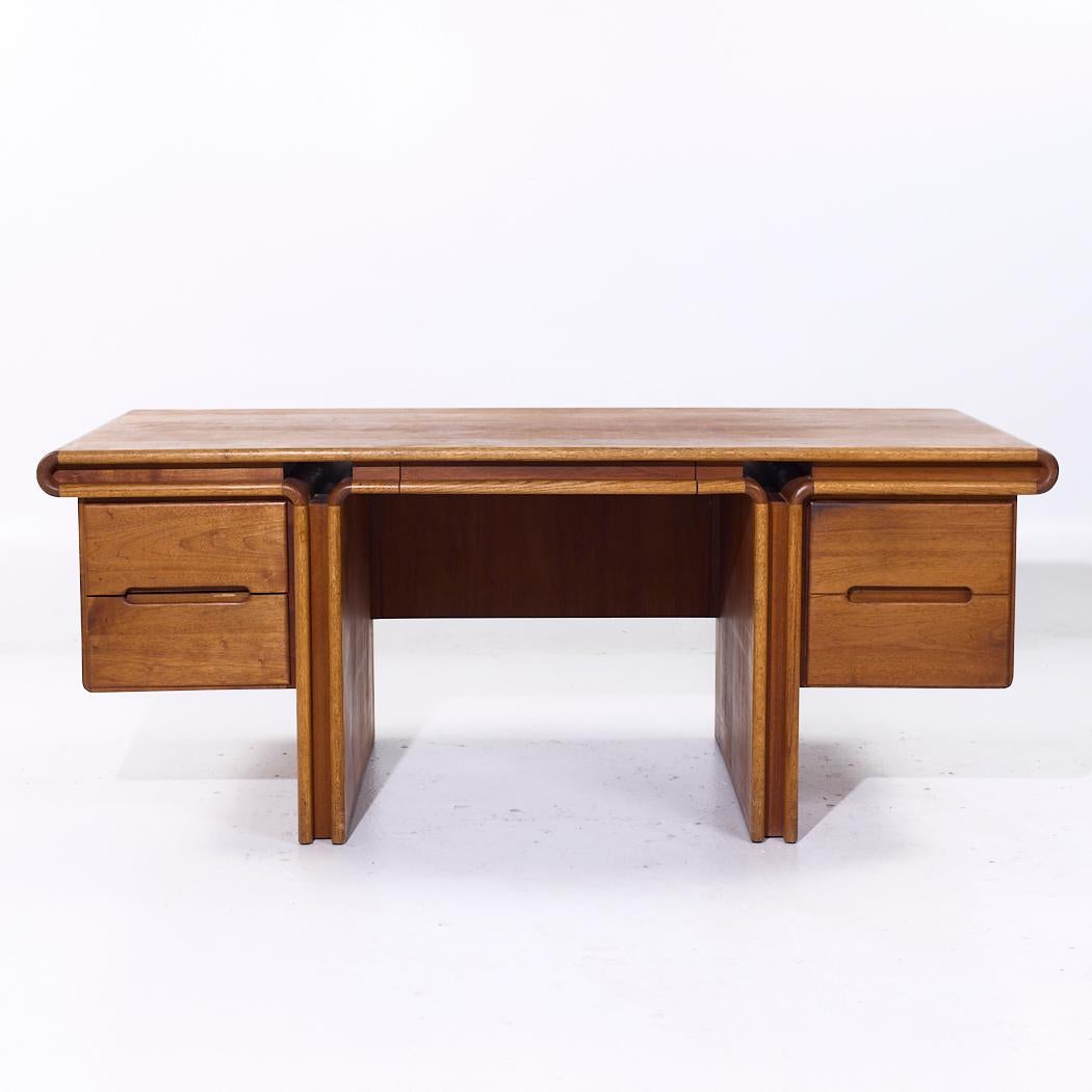 Lou Hodges for Creative Crafts Mid Century Curved Walnut Executive Desk

This desk measures: 73.75 wide x 34 deep x 29.25 high, with a chair clearance of 25.5 inches

All pieces of furniture can be had in what we call restored vintage condition.