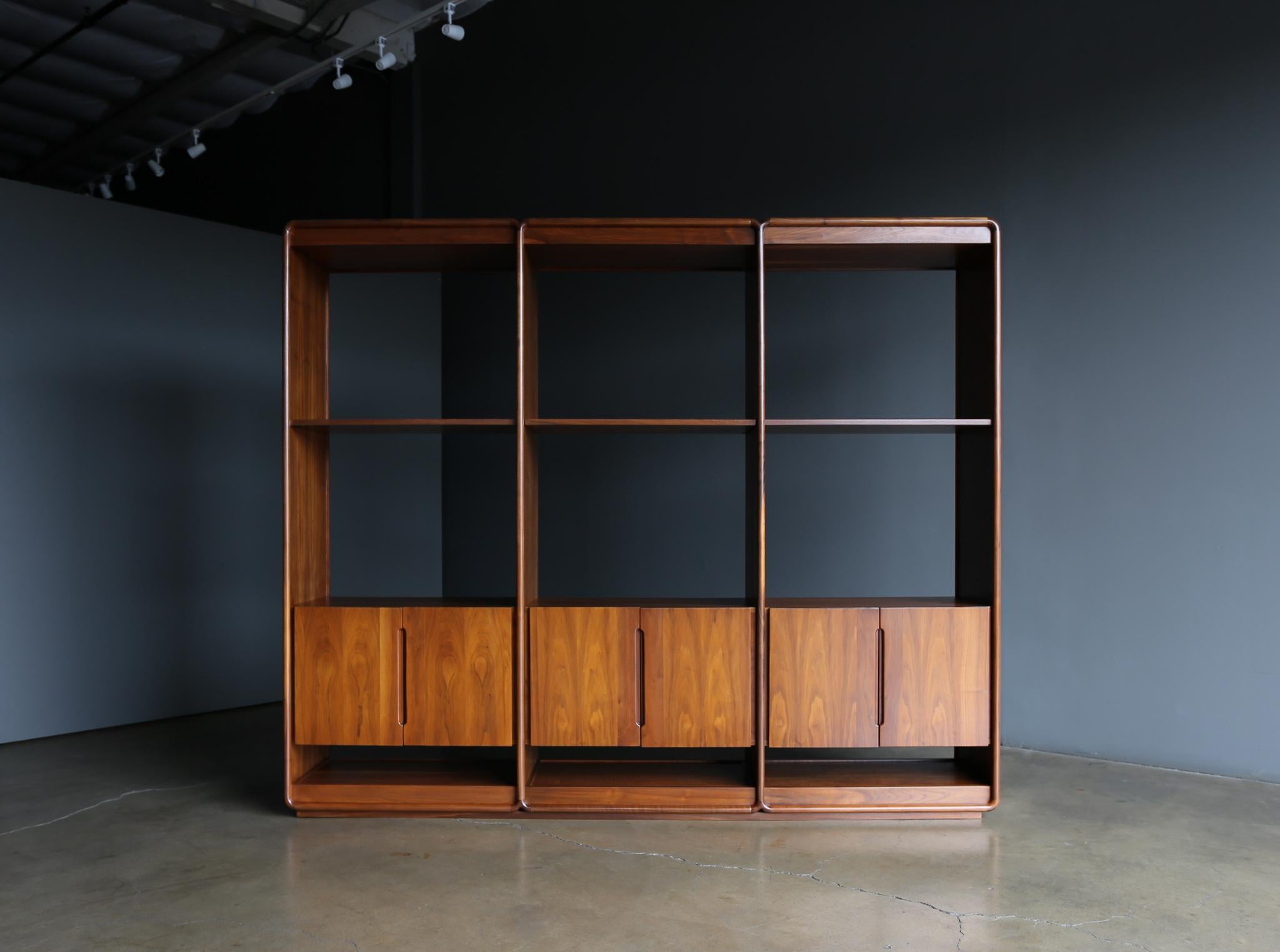 Lou Hodges Handcrafted Walnut Wall Unit for California Design Group, 1978. This piece has been professionally restored. Stamped with the makers mark to the interior. 

