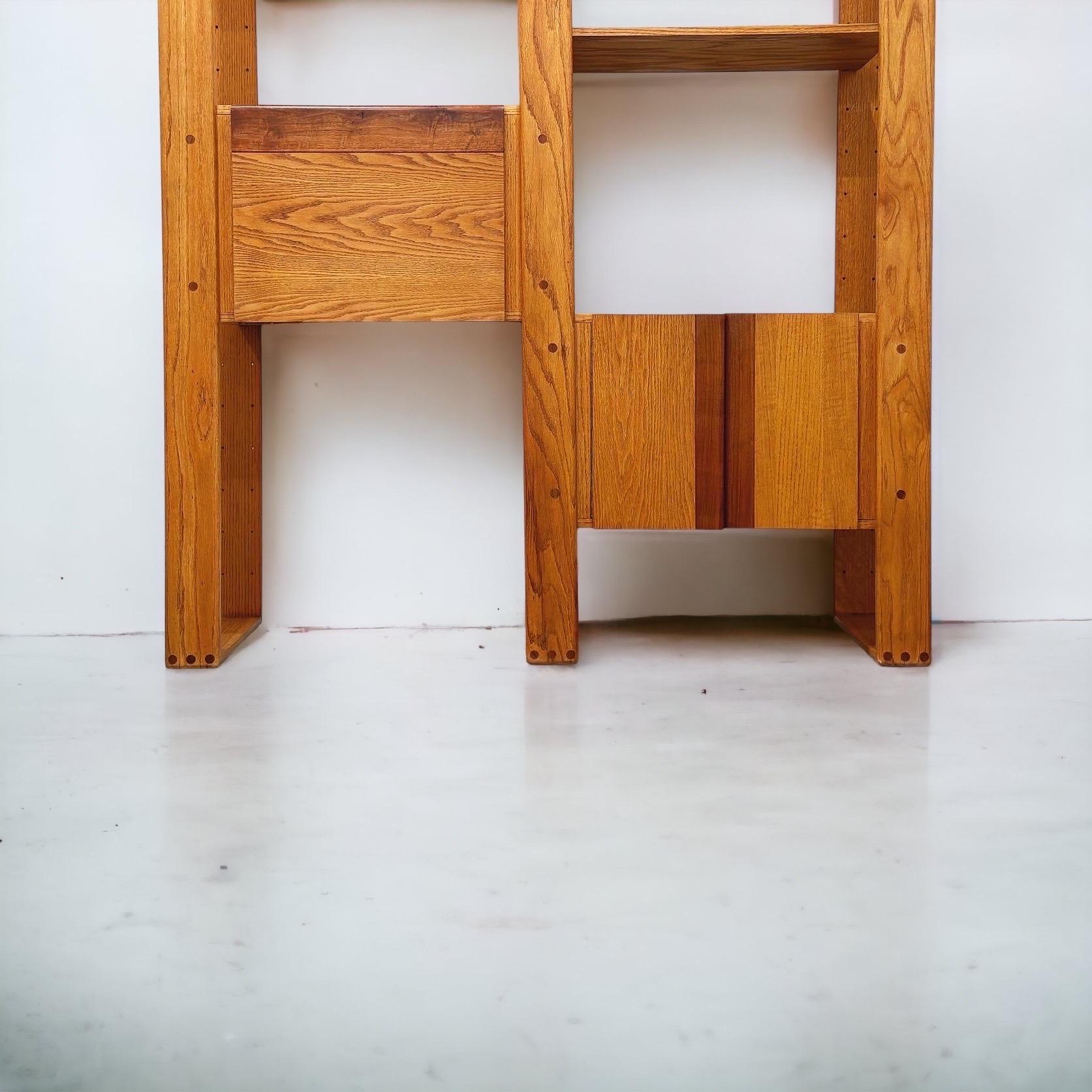 Lou Hodges handcrafted solid oak wall unit for California Design Group, signed and date 1978. This piece has been professionally restored and attended to by our team - it is in excellent condition and is ready for use.

