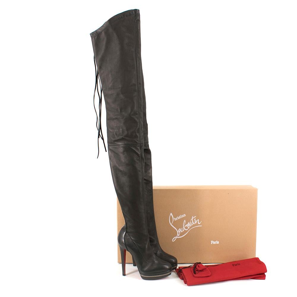 Louboutin Black Unique Platform Thigh High Boots

Zips at ankle
Decorative zippers on back of leg with tassel
Platform with decorative zipper
Sloped edges at top
Classic red bottoms
Extra tall over knee

Please note, these items are pre-owned and