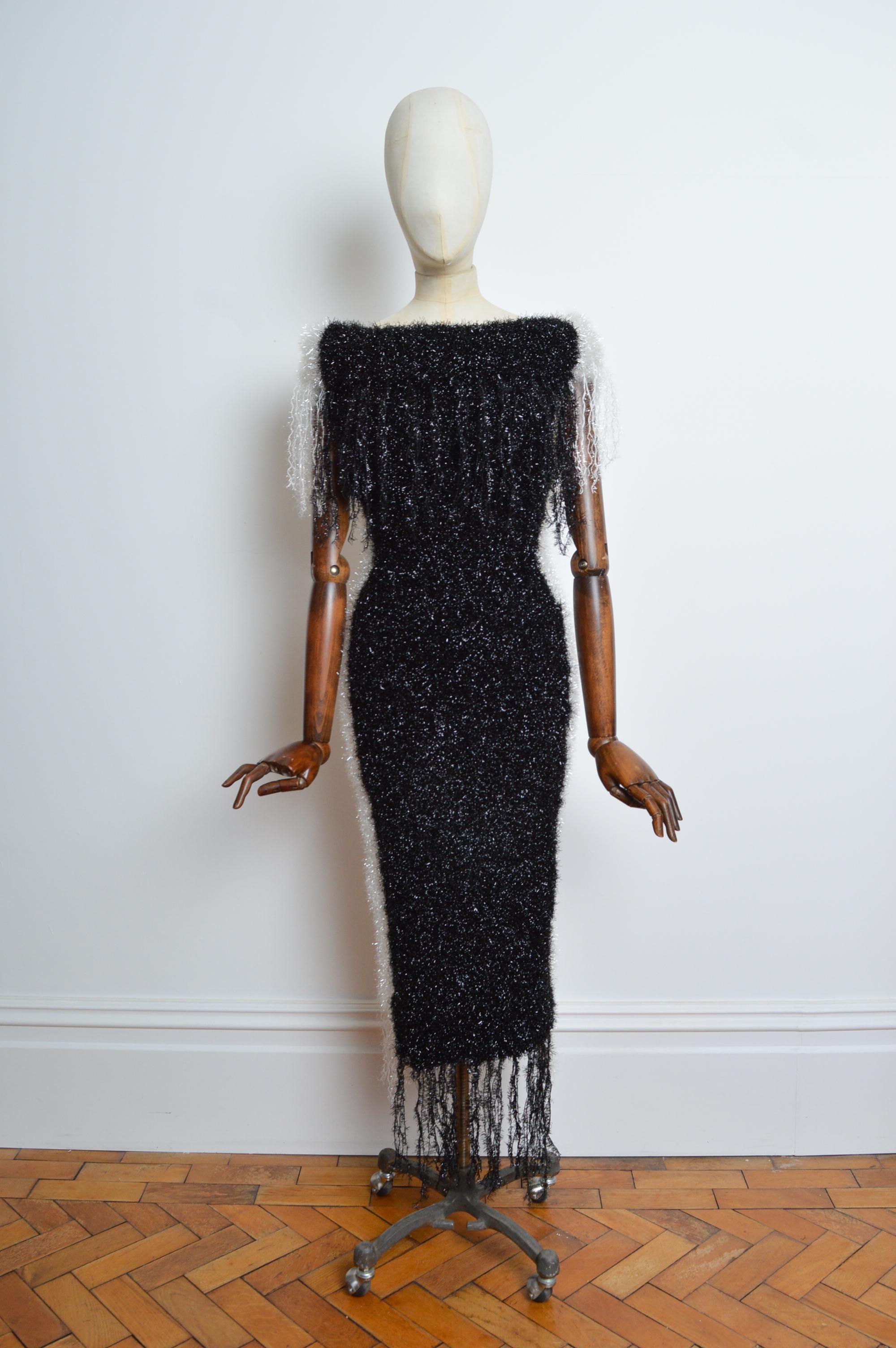 Loud 1990’s Garish White & Black Tinsel Glitter Evening Dress 
Size; One Size (Stretchy) UK 6 - 10. 
Measurements are provided in inches (‘’)
Pit to Pit; 17’’ - 21’’ 
Nape to Hem; 50’’ Approx
Waist; 28’’ - 32’’
Condition; 10/10
Material; Tinsel /