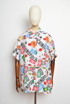 Camisa hawaiana llamativa de MOSCHINO de los años 90, con estampado colorido de Monopoly, tallas L-XL