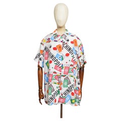 Camisa hawaiana llamativa de MOSCHINO de los años 90, con estampado colorido de Monopoly, tallas L-XL