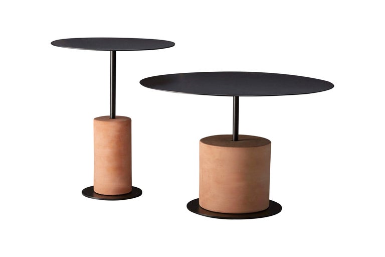Grounded in the tradition of terra-cotta and amplified by a totemic approach, the small Louie side table is iconic and timeless.

This collection of side tables has been developed with a base in sealed Terracotta.

With a soft natural finish it