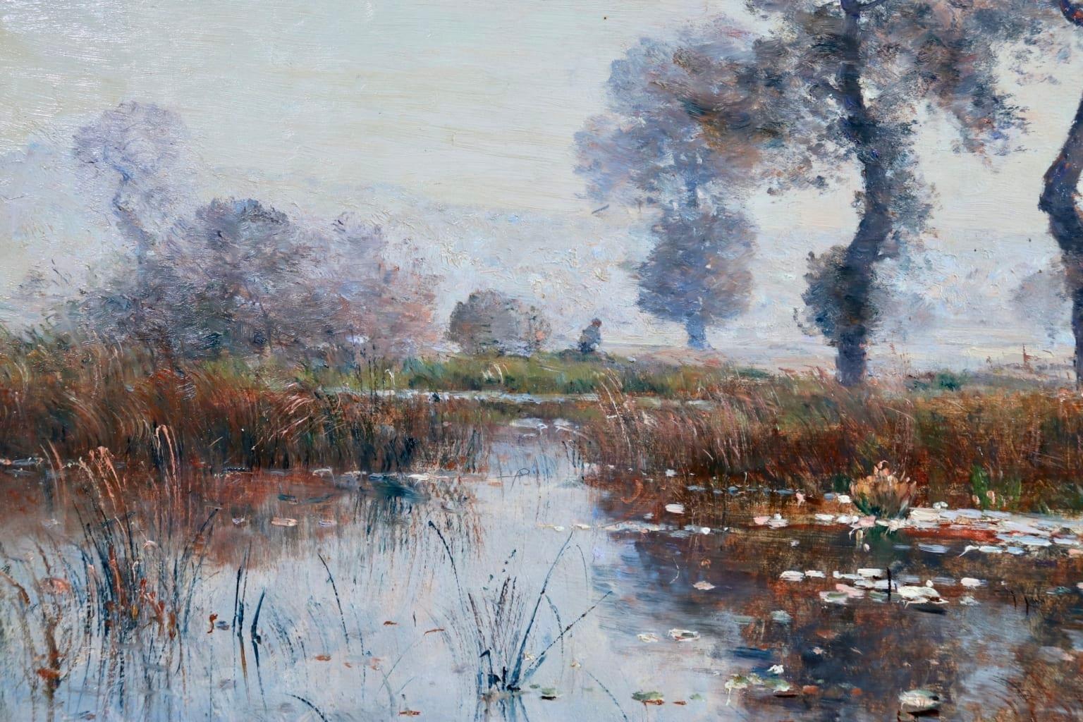 A stunning oil on canvas by French Barbizon painter Louis Aime Japy depicting water lilies on a lake in a cool autumn landscape, the almost bare trees beautifully reflected in the water.

Signature:
Signed lower right. 

Dimensions:
Framed: