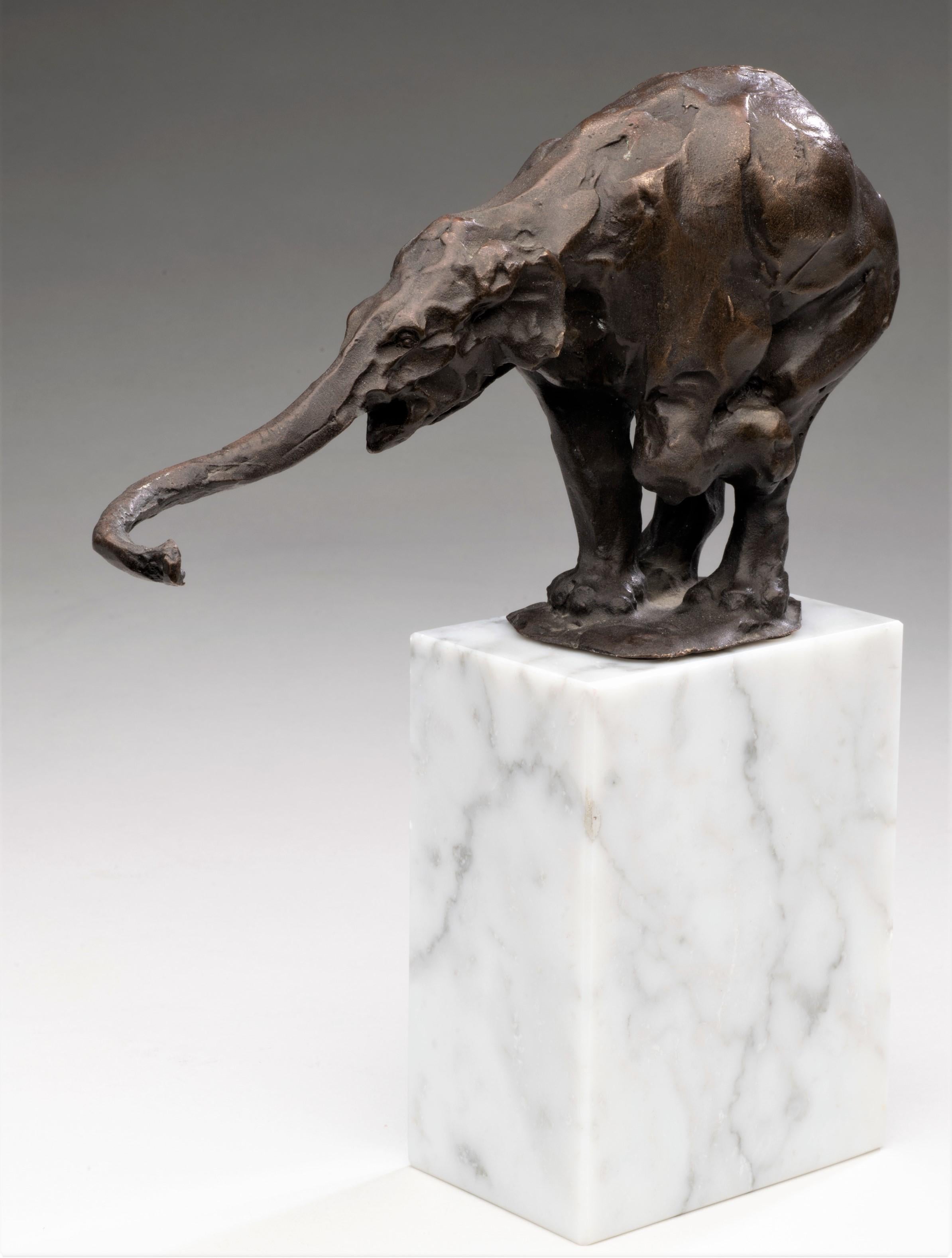 Balancing Elephant
Louis-Albert Carvin (France, 1875-1951)
Bronze, marble 
Circa 1930s, Art Deco
8 x 7.5 x 2 (4 1/4 x 7 1/2 x 1 7/8 figure) inches 

Artist Louis-Albert Carvin, born in Paris in 1875, was exposed to art from an early age through his