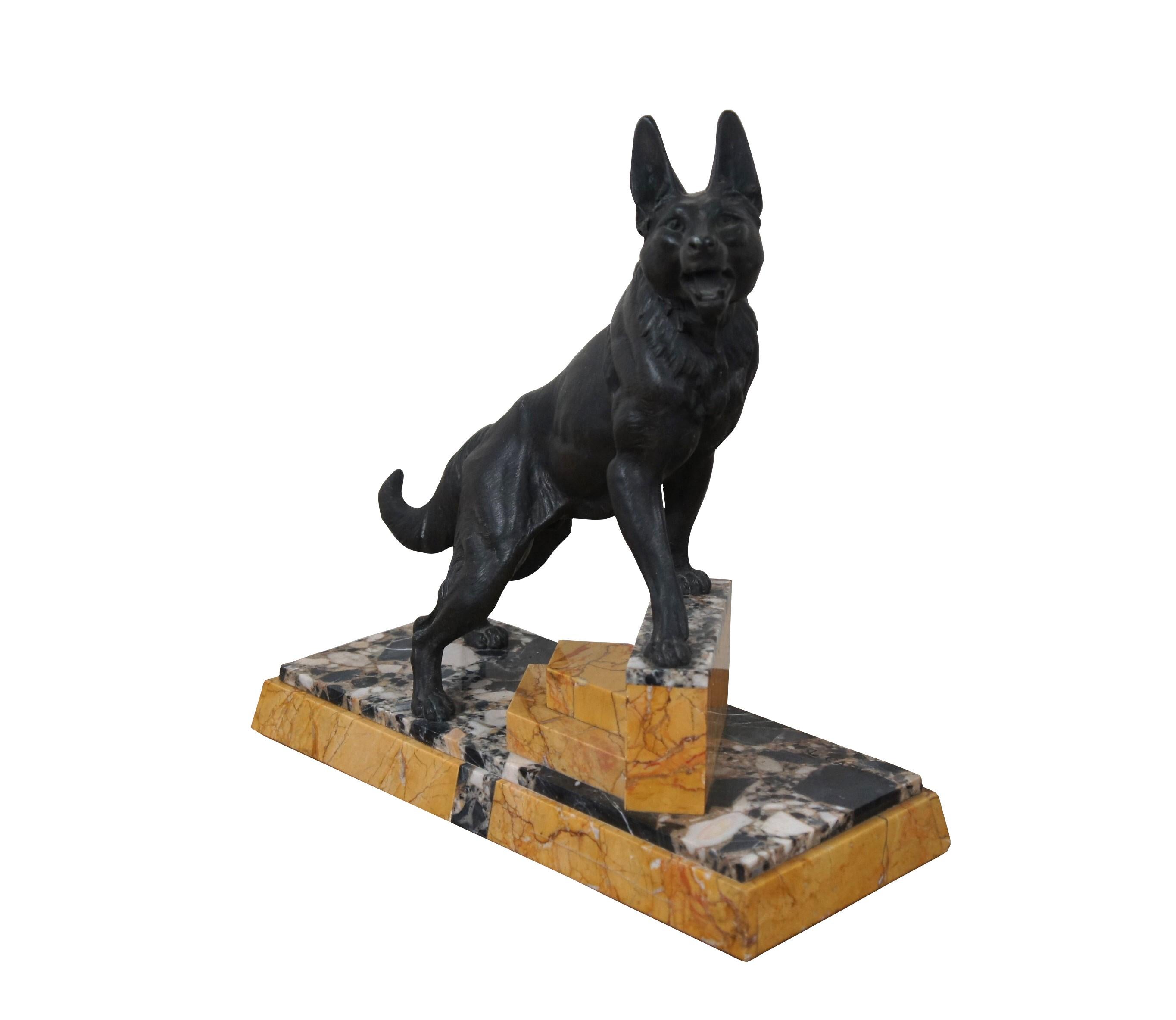 Antique early 20th century art deco spelter sculpture / statue after Louis Albert Carvin, depicting a large wolf like Alsatian German Shepherd / dog with collar, standing on a small set of steps crafted of golden yellow and black and white