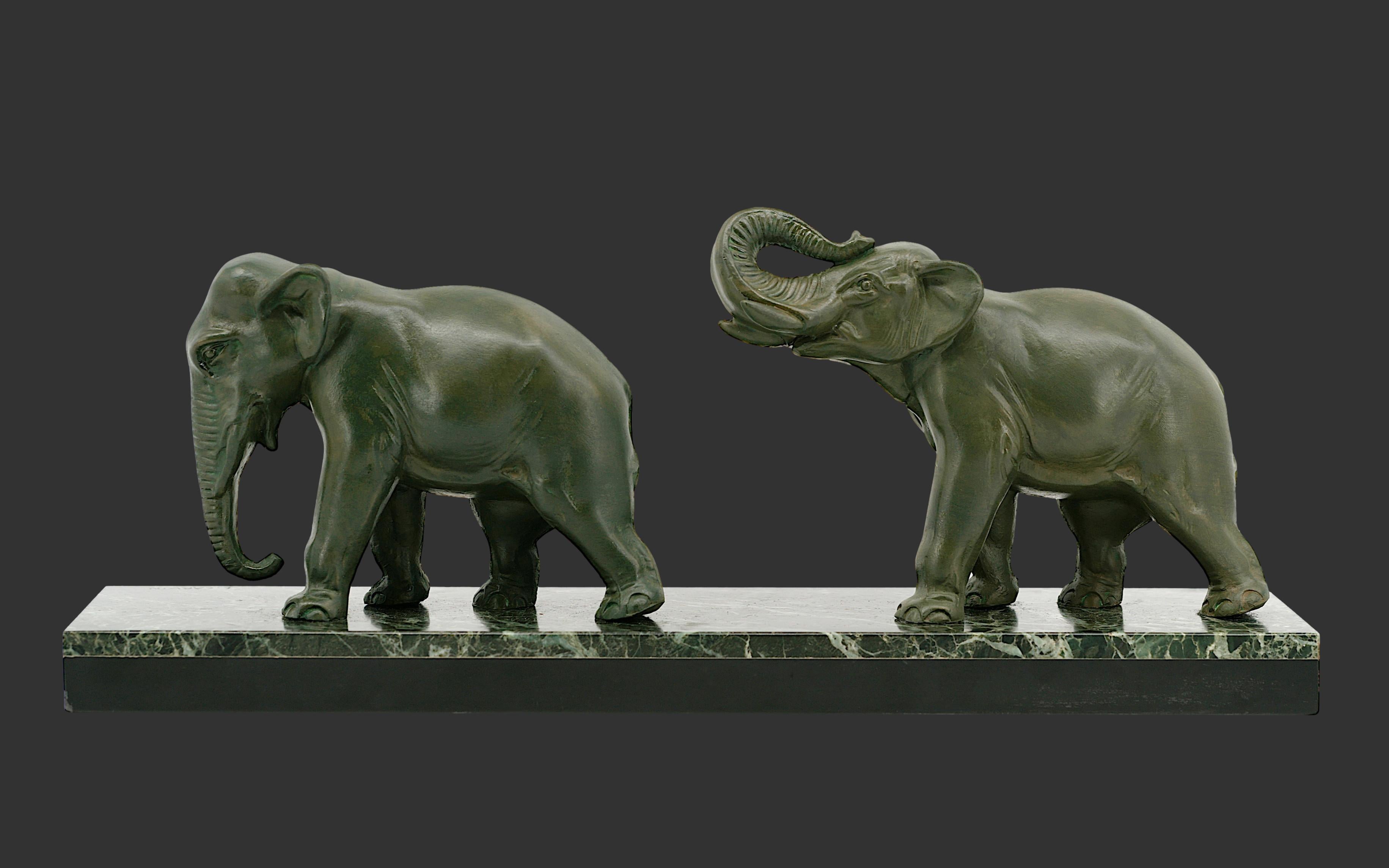 Elephant couple sculpture by Louis-Albert CARVIN, France, ca.1920. Spelter and marble. Beautiful patina. Height: 7.1