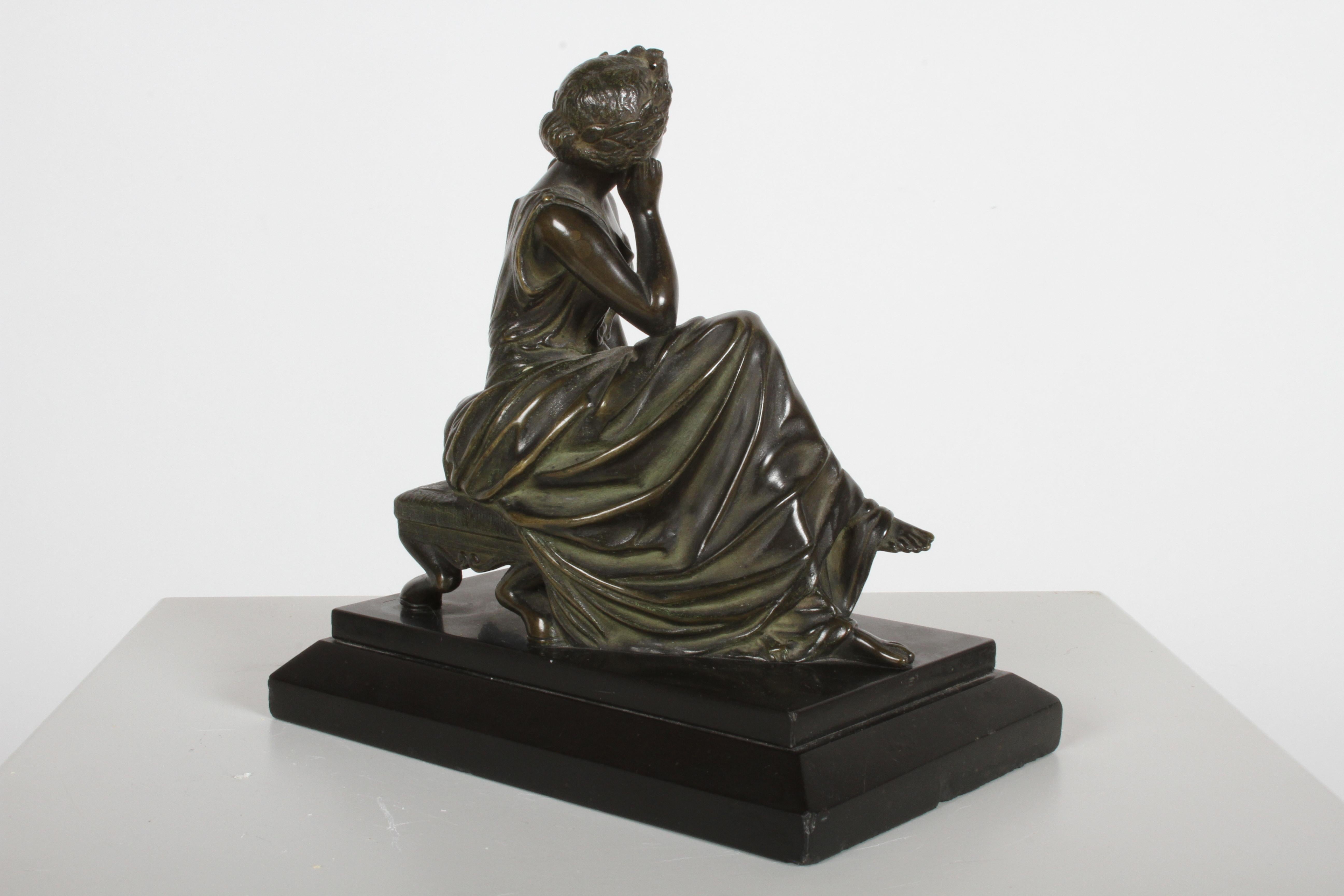 bronze mirror with a support in the form of a draped woman