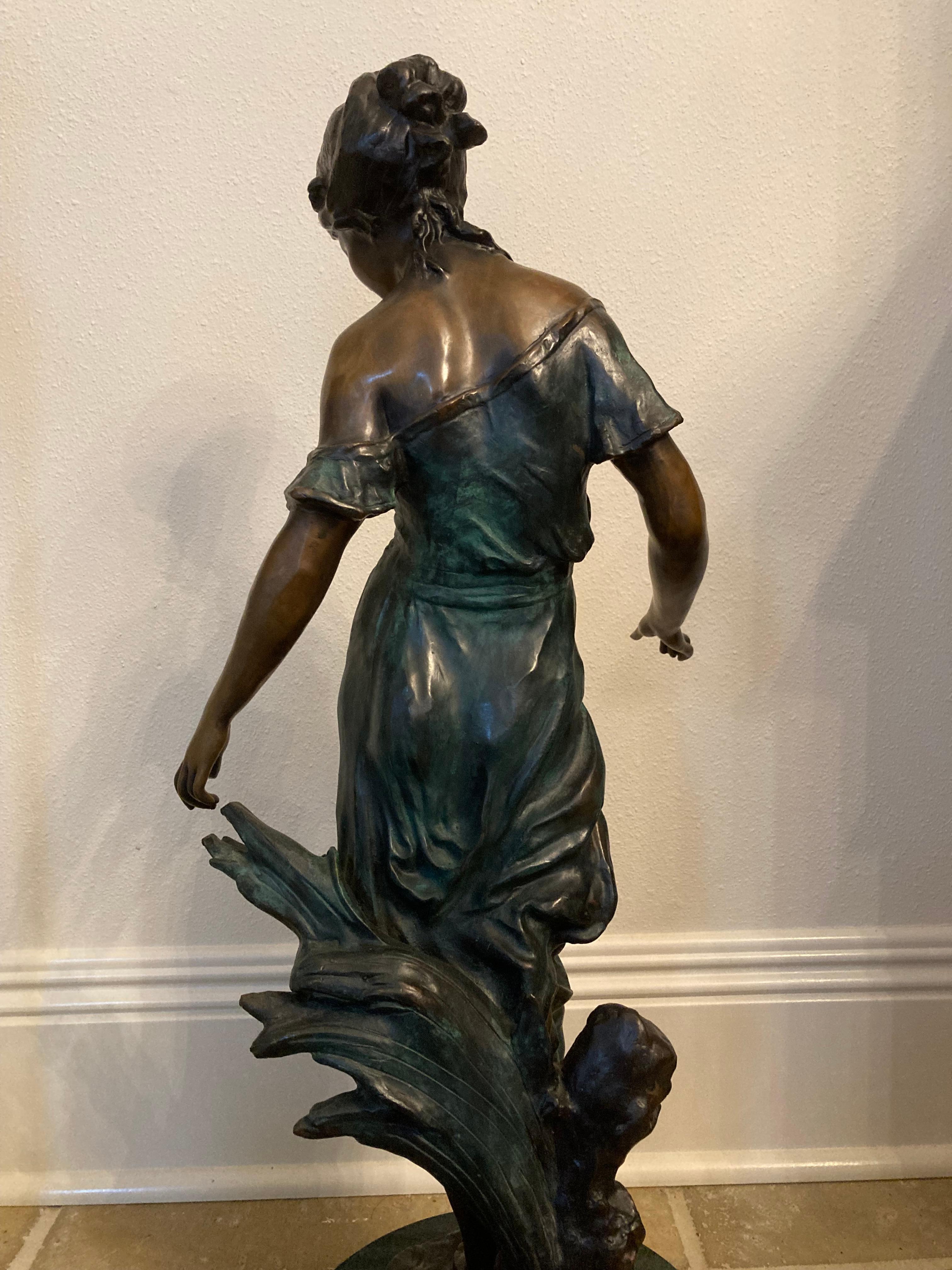 An exquisite bronze by French sculptor Auguste Moreau, a very highly regarded artist who showed regularly in the Paris Salon shows in the early 20th century. He often depicted cherubs, but his most prized bronzes are of lovely young women with