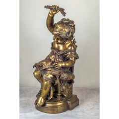 Sculpture française en bronze patiné d'une fille avec une poupée par Auguste Moreau