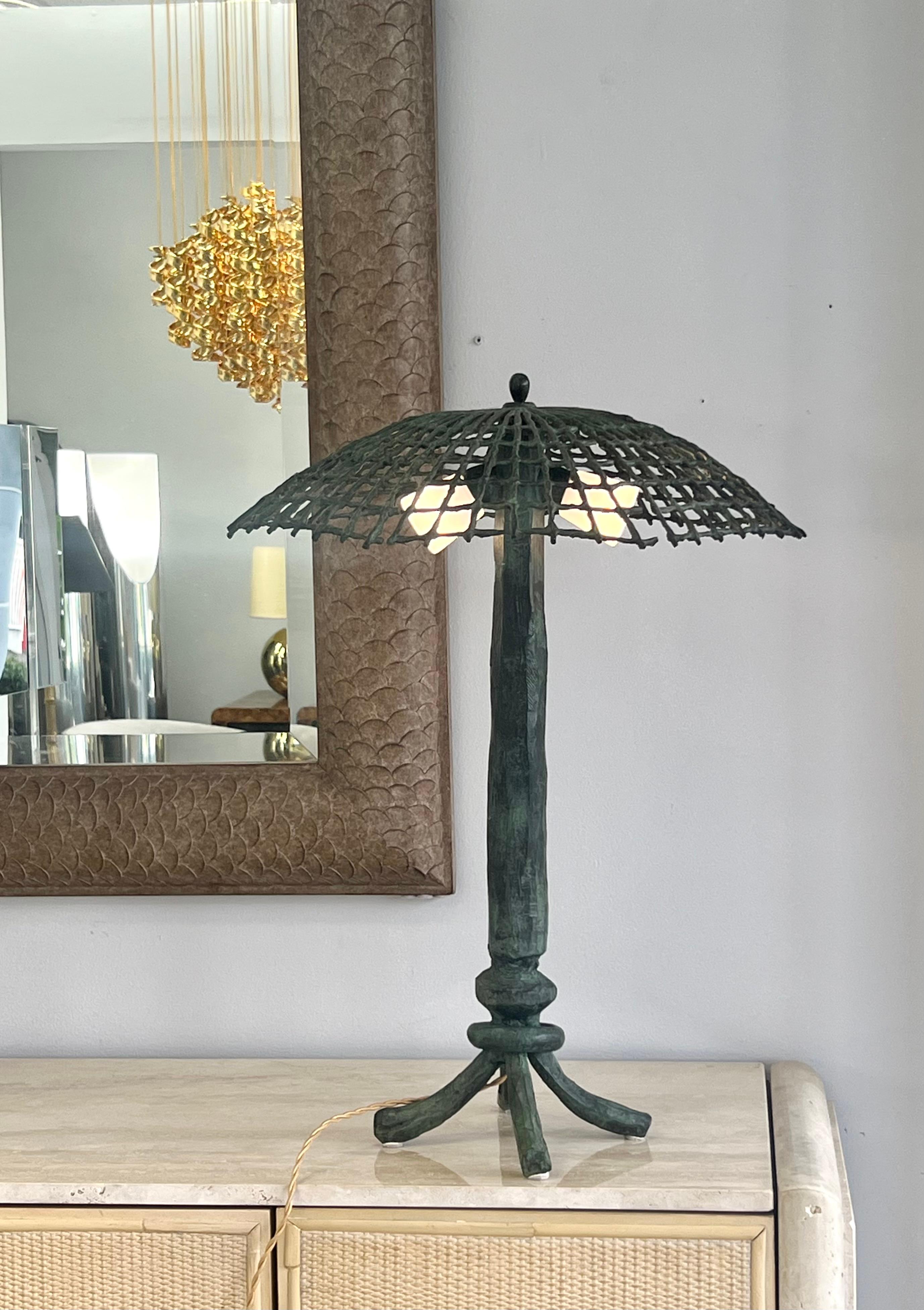 Sculptural green patinated bronze lamp and shade with glass diffusers. Designed by French artist Louis Cane in a very small edition of 8 in 1995, this example being number 3. Base is solid bronze in a style reminiscent of Giacometti.  

Louis Cane