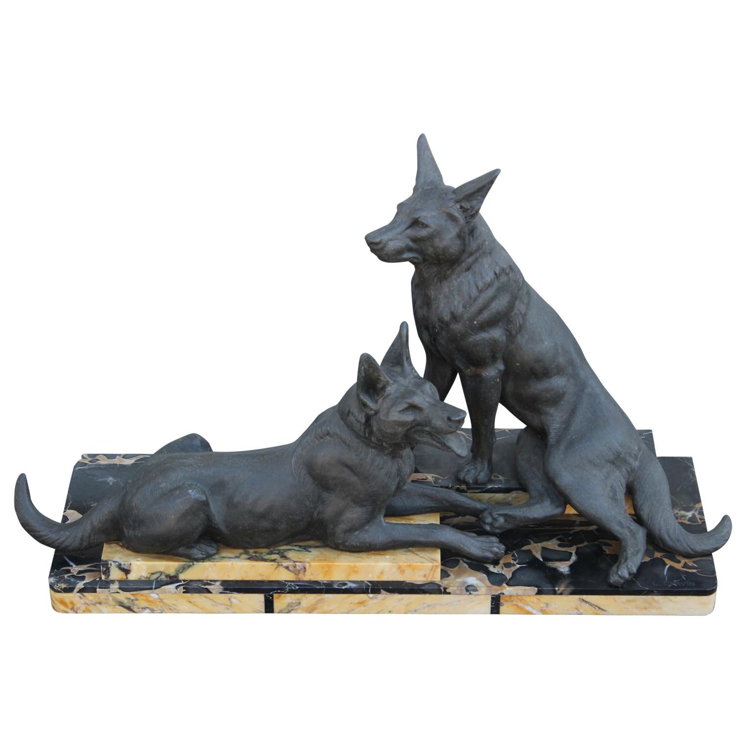Louis Carreon Figurative Sculpture - Art Deco Sculpture of Bronze German Shepherds Lounging on Marble Slabs