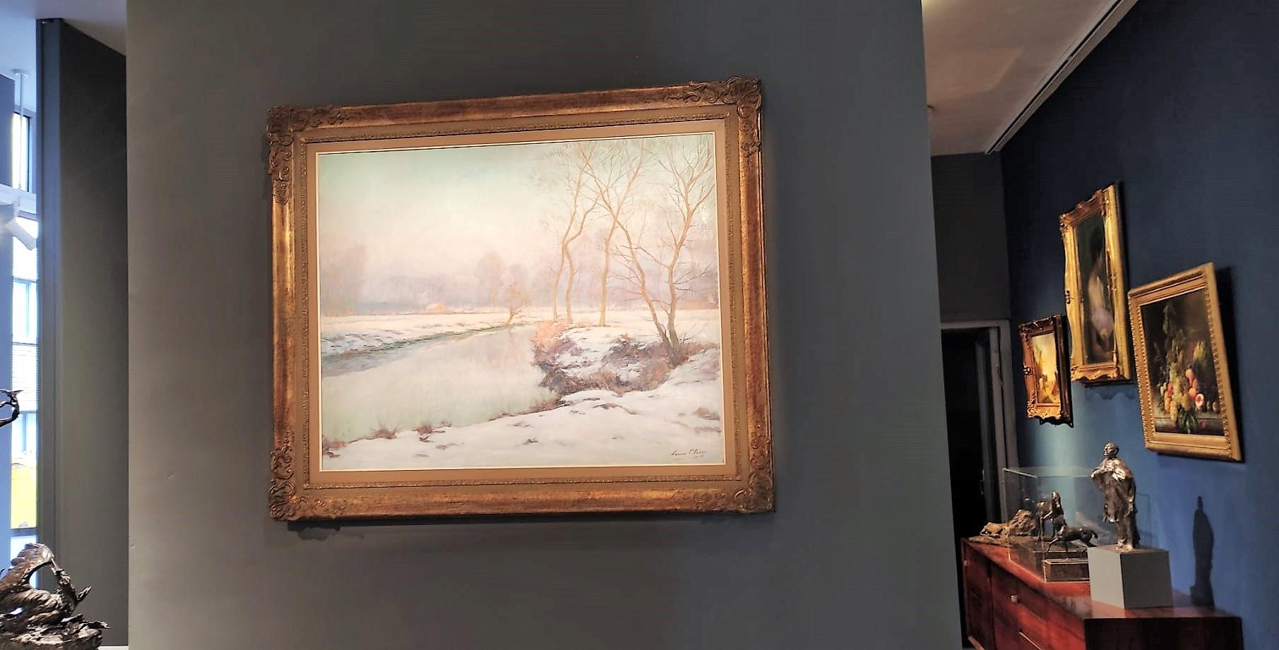Uno splendido paesaggio di neve di Louis Clesse che può facilmente essere paragonato ai paesaggi invernali di Emile Claus in termini di atmosfera e aspetto. Qui, Clesse dipinge nuovamente la Zenne vicino a Beersel, la regione in cui è nato.

Louis