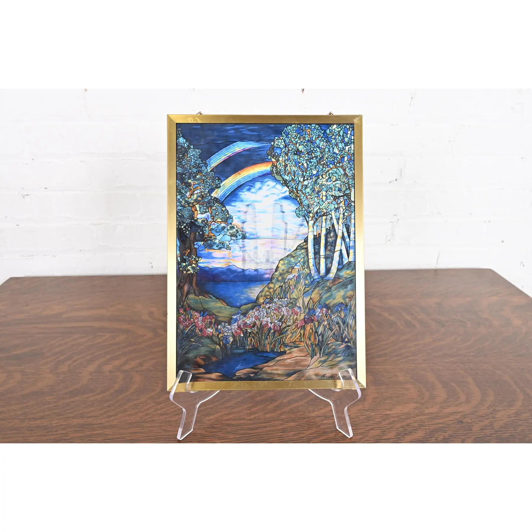 A gorgeous reproduction Louis Comfort Tiffany Art Nouveau stained glass double rainbow suncatcher

By Glassmasters

USA, Late 20th Century

Measures: 9.25