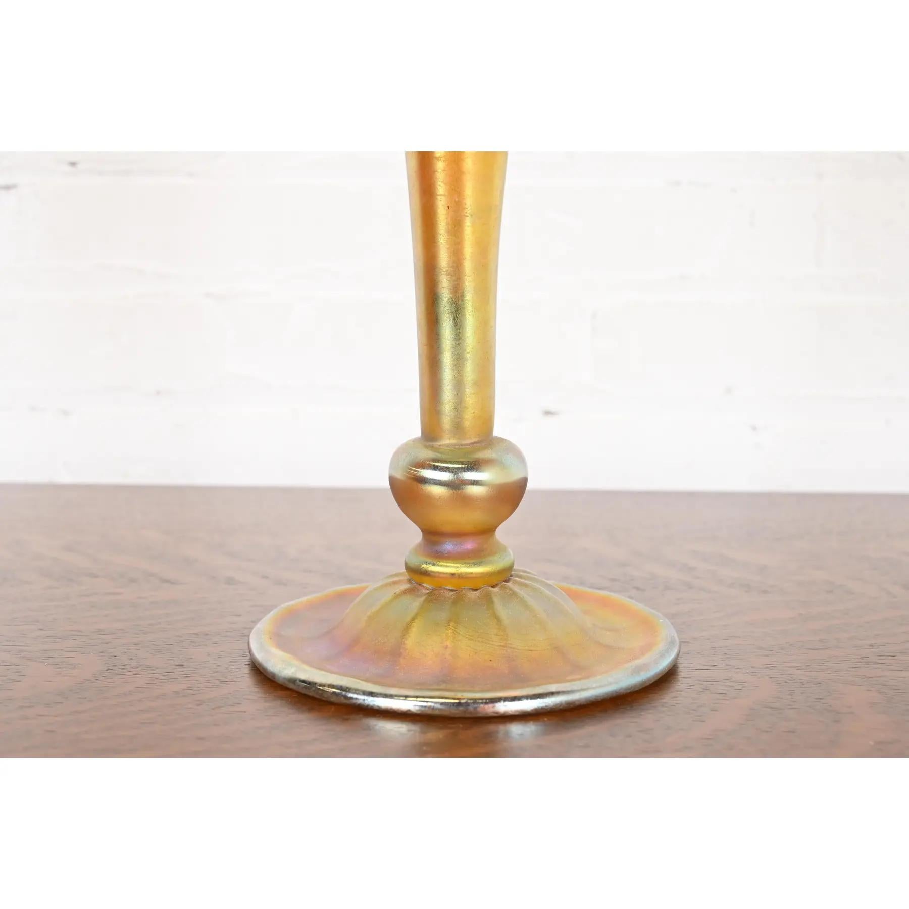 A gorgeous Arts & Crafts or Art Nouveau period Favrile iridescent art glass tall trumpet vase

By Louis Comfort Tiffany for Tiffany Studios (signed to the underside)

USA, Circa 1910

Measures: 7.5