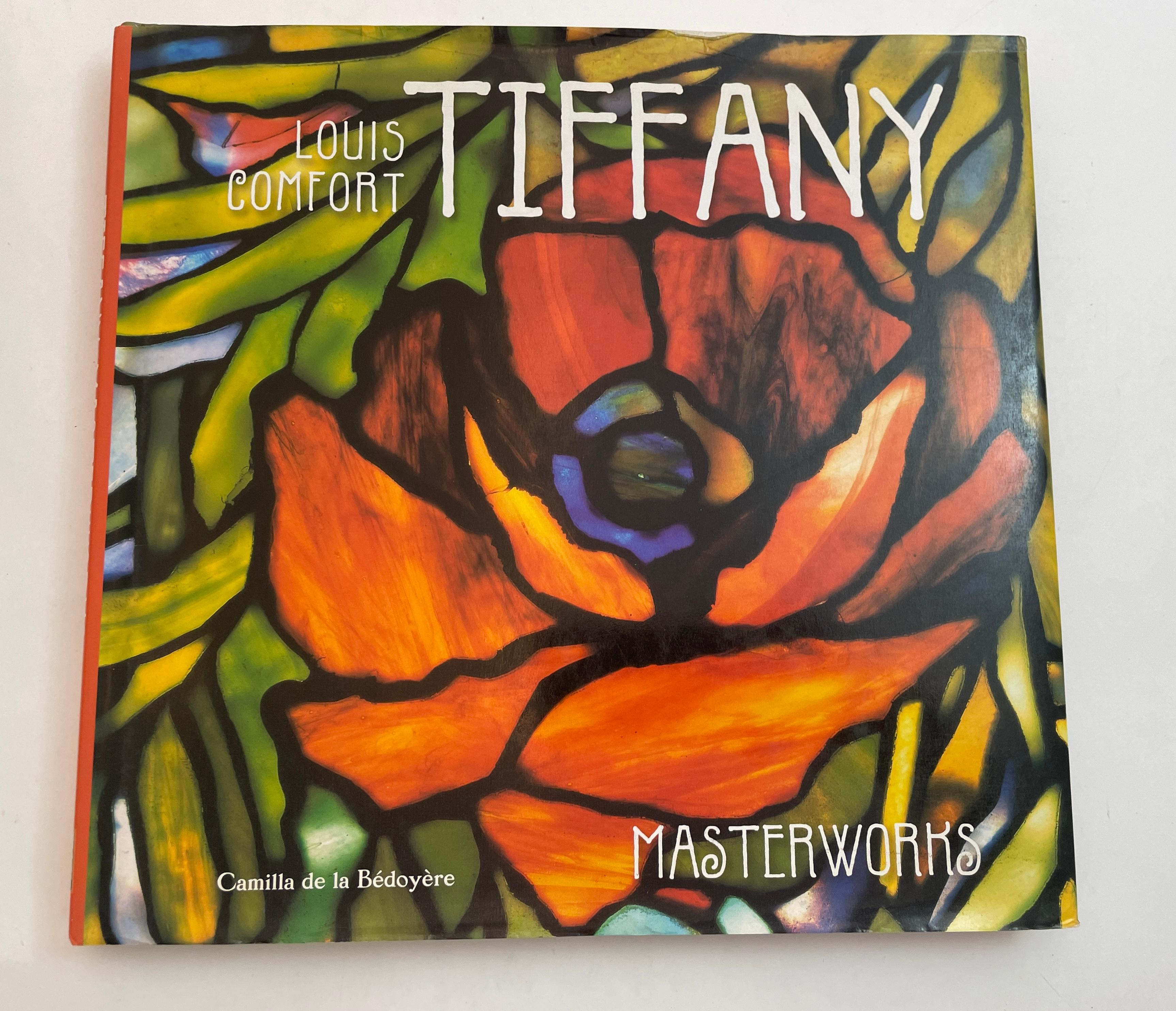 Louis Comfort Tiffany Masterworks Hardcover Book by Bedoyere D. E. La Camilla.
Louis Comfort Tiffany was highly skilled in jewellery design, as well as ceramics, enamels, and metalwork. However, he is best known for his beautiful stained-glass