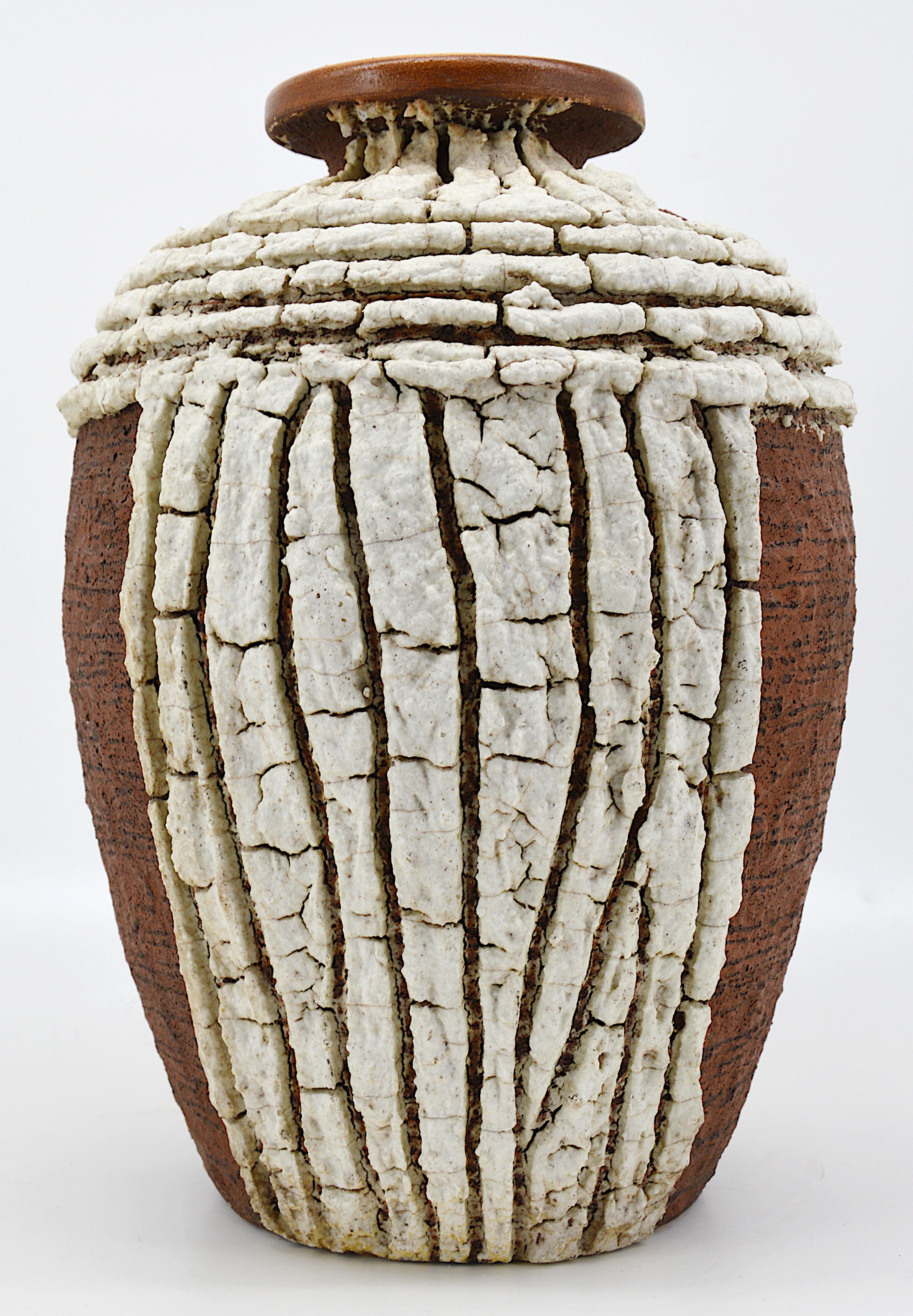 French Art Deco vase by Louis Dage (Antony, Paris), France, 1920s. Stoneware. Important enamel applications for a masterpiece of Africanism. Measures: Height: 12.8
