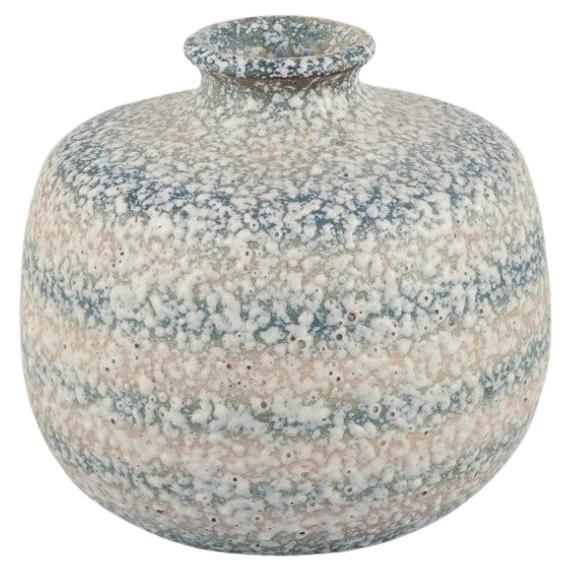 Louis Dage, French ceramist. Unique ceramic vase. Glaze in blue and sandy tones. For Sale